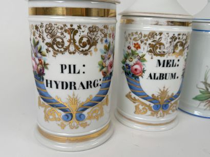 Suite of three enameled porcelain medicine...