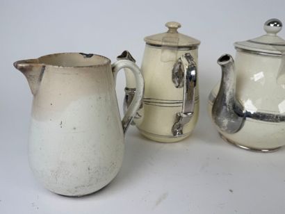 LANGEAIS.
Seven pieces in cream and silver...