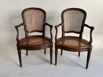 Pair of molded and carved wooden armchairs...