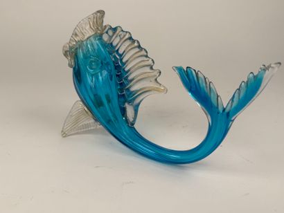 A blown glass subject, partially colored...