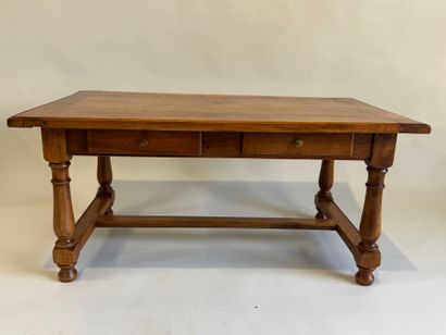 Coffee table opening with two drawers in...