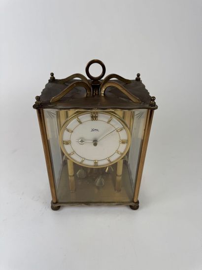KOMA.
Brass and beveled glass table clock.
25...