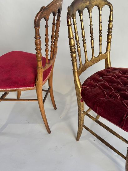 Two charivari chairs in molded and gilded...
