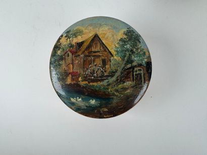 Two boxes comprising :
- a circular wooden...