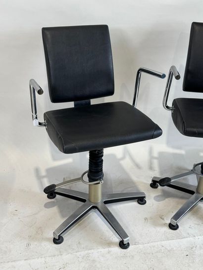 Pair of chromed metal and leather barber...