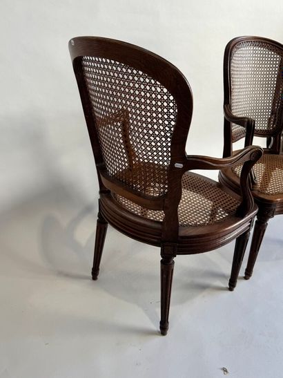 Pair of molded and carved wooden armchairs...