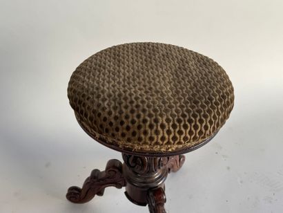 Molded and carved wooden piano stool, circular...