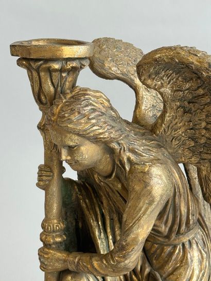 Carved and gilded wood archangel forming...