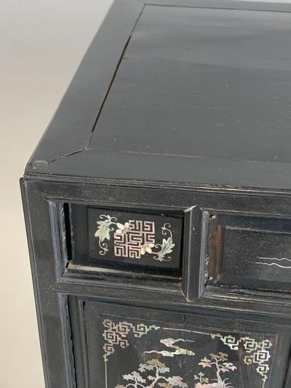 ASIA, 20th C. Low cabinet opening with two...