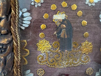 Small reliquary frame in gilded and carved...