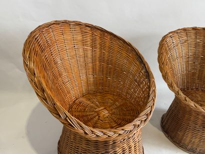 Three wicker armchairs, wraparound back and...
