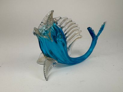 A blown glass subject, partially colored...
