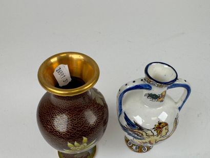 Lot including:
- GIEN.
Small polychrome earthenware...