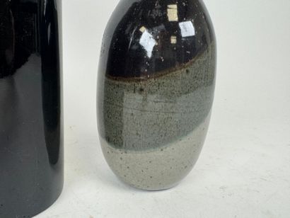 Set of two ceramic vases and a bottle with...
