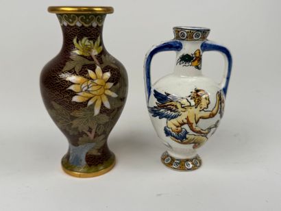 Lot including:
- GIEN.
Small polychrome earthenware...