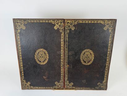 Leather desk set with gold embossed foliate...