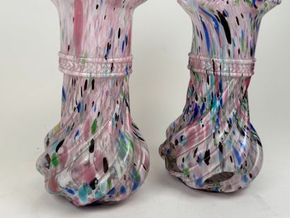 Two baluster vases with torsos and wavy necks...