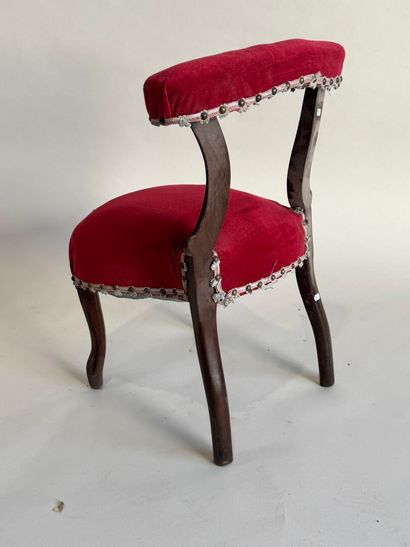 Molded wood chair with red velvet seat cover...