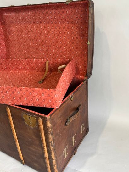Wooden trunk, leather-covered and reinforced...