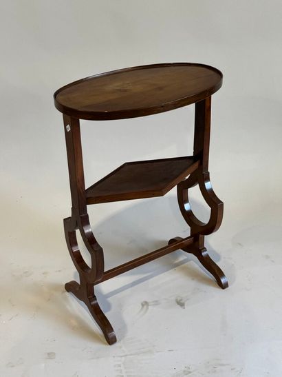 Small oval fruitwood table with lyre legs...