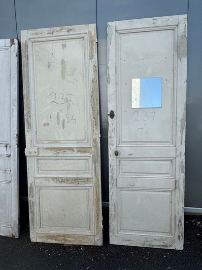 Suite of eight doors in molded and painted...