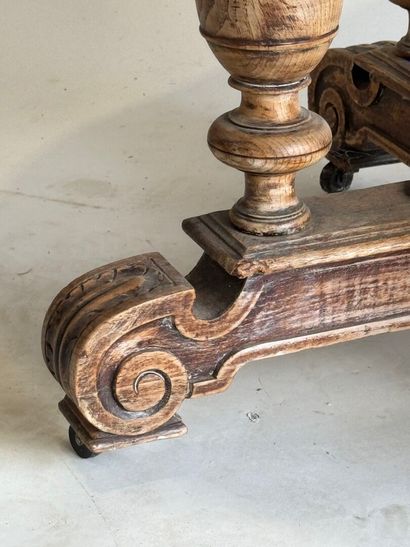 Large molded oak pedestal table on casters.
Henry...