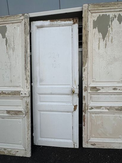 Suite of eight doors in molded and painted...