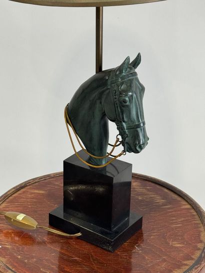 Regula lamp with green patina featuring a...