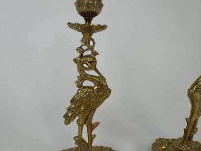 Pair of chased brass torches decorated with...