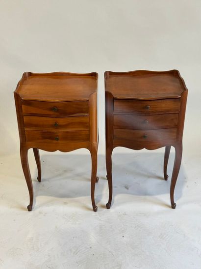 Pair of molded cherrywood bedside tables...