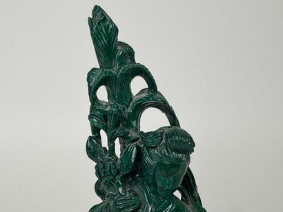CHINA, 20th century.
Woman with flowers.
Carved...
