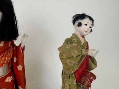 ASIA, 20th century.
Two figures in traditional...