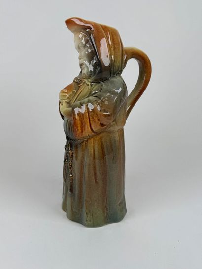 Polychrome earthenware pitcher featuring...