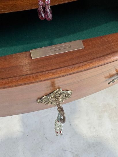 Molded wood chest of drawers opening with...