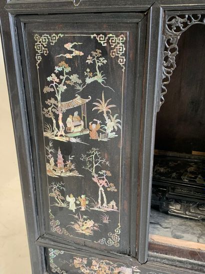 ASIA, 20th C. Low cabinet opening with two...