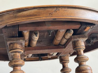 Large molded oak pedestal table on casters.
Henry...