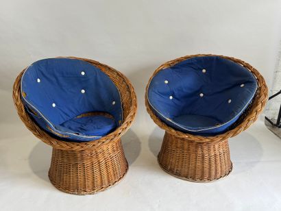 Three wicker armchairs, wraparound back and...