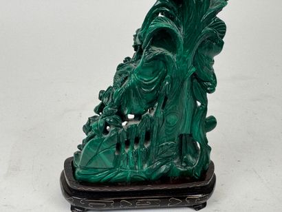 CHINA, 20th century.
Woman with flowers.
Carved...