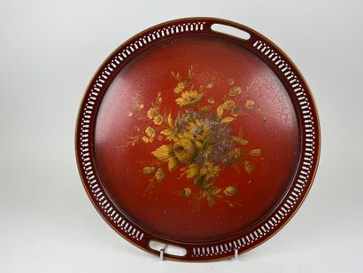 Circular tray in red and gold lacquered metal...