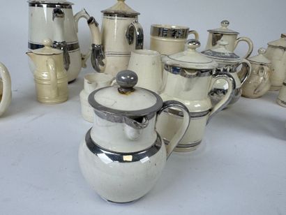 LANGEAIS.
Seventeen cream and silver-plated...