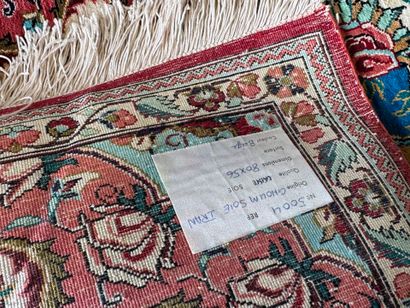 GHOUM. 
Hand-knotted polychrome silk carpet...