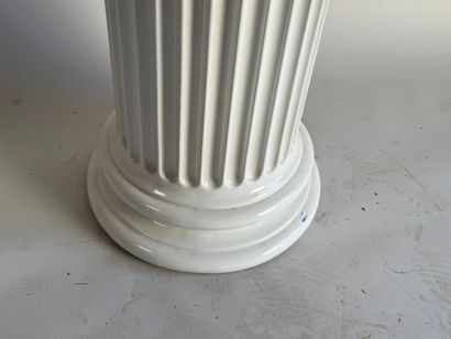 Enameled porcelain saddle with fluted half...
