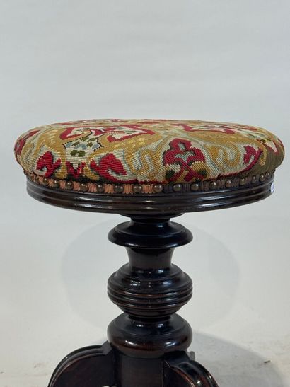 Circular tripod piano stool in molded and...