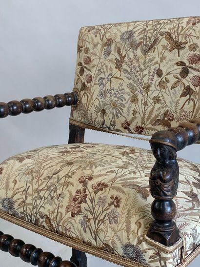 Armchair in stained natural wood, the armrests,...