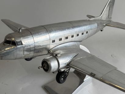 20th century school. 
Douglas DC-3 aircraft....