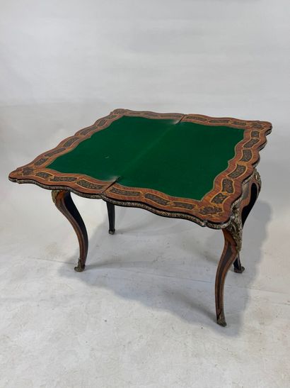 Wood and marquetry game table featuring a...