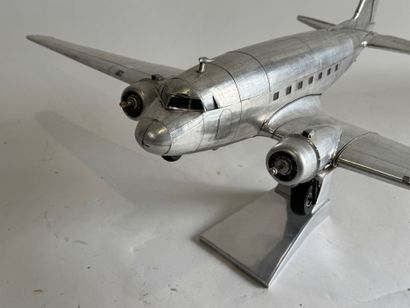 20th century school. 
Douglas DC-3 aircraft....