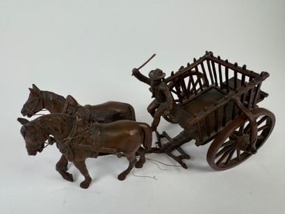 Small regule subject depicting a carriage.
11...