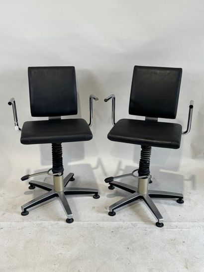 Pair of chromed metal and leather barber...
