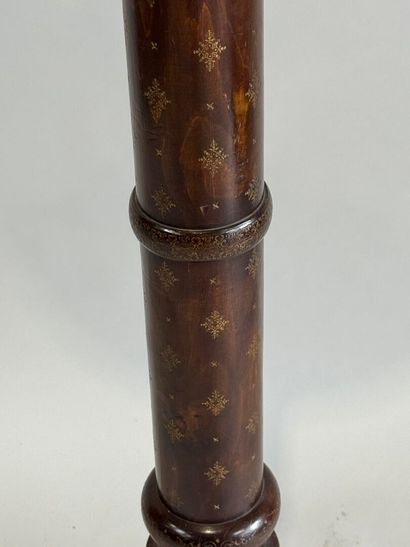 Turned wood floor lamp with gold stylized...